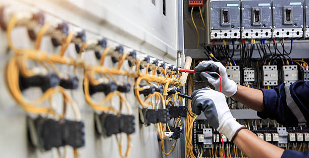 Professional Electrician technician working in Magnolia Springs, AL